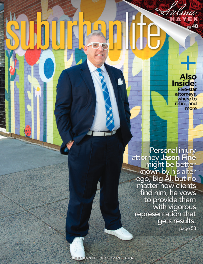 jfinelaw article from suburbanlife, lawyer in suit smiling in cover image